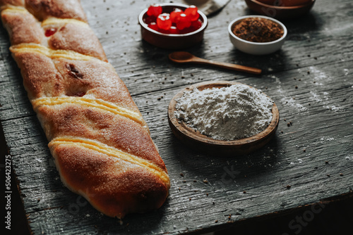 preparing catalan sweet cake coca de sant joan photo