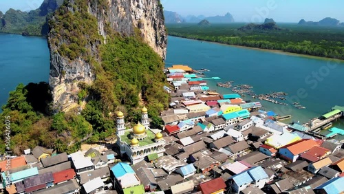 Ko Panyi or Koh Panyee, Muslim fisherman village landmark attractions travel by boat at Ao Phang Nga Bay National Park, Thailand. South East Asia photo