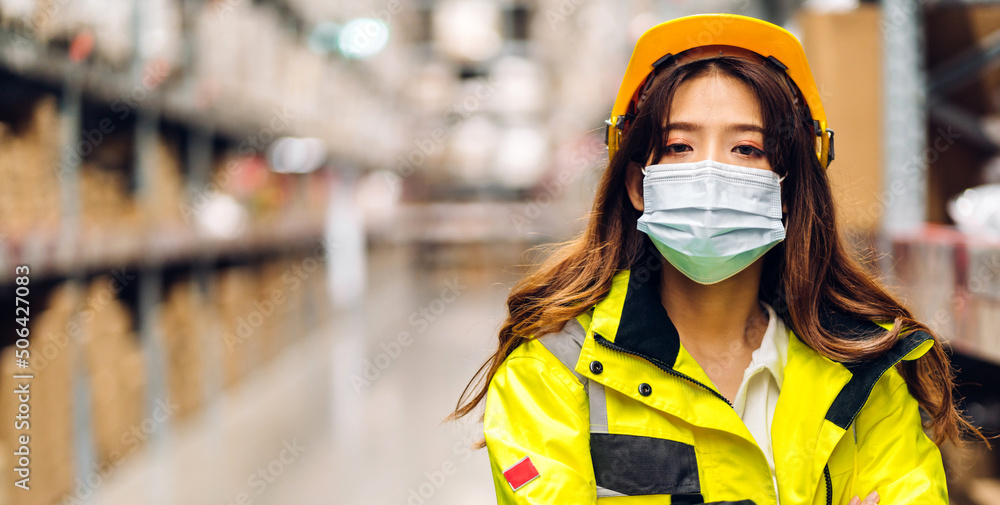 Portrait asian engineer woman shipping order detail check goods and supplies on shelves with goods background inventory in factory warehouse.logistic industry and business export Portrait asian engineer woman shipping order detail check goods and supplies on shelves with goods background inventory in factory warehouse.logistic industry and business export