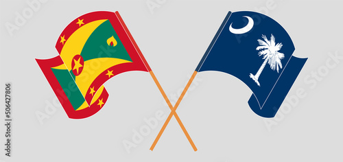 Crossed and waving flags of Grenada and The State of South Carolina