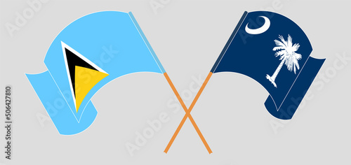 Crossed and waving flags of Saint Lucia and The State of South Carolina