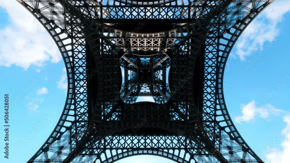 A view up through the center of the wrought-iron structure of the Eiffel Tower in Paris, France.