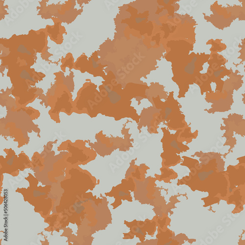 Desert camouflage of various shades of grey, brown and orange colors