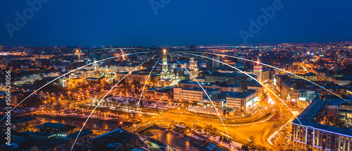 Concept of internet connection technology on night city background. Global internet lines connect society. Abstract concept of networking