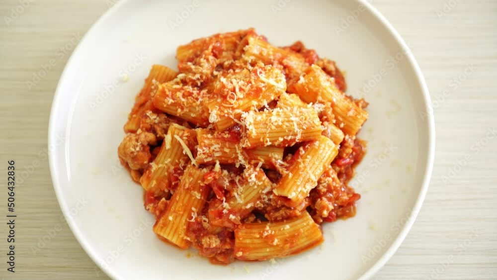 Bolognese rigatoni pasta with cheese - traditional Italian pasta Bolognese rigatoni pasta with cheese - traditional Italian pasta