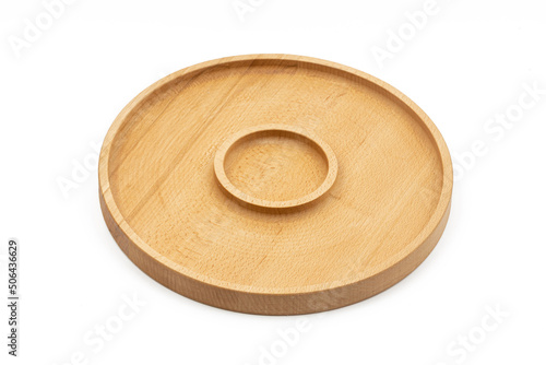Handmade wooden dishes isolated above white background