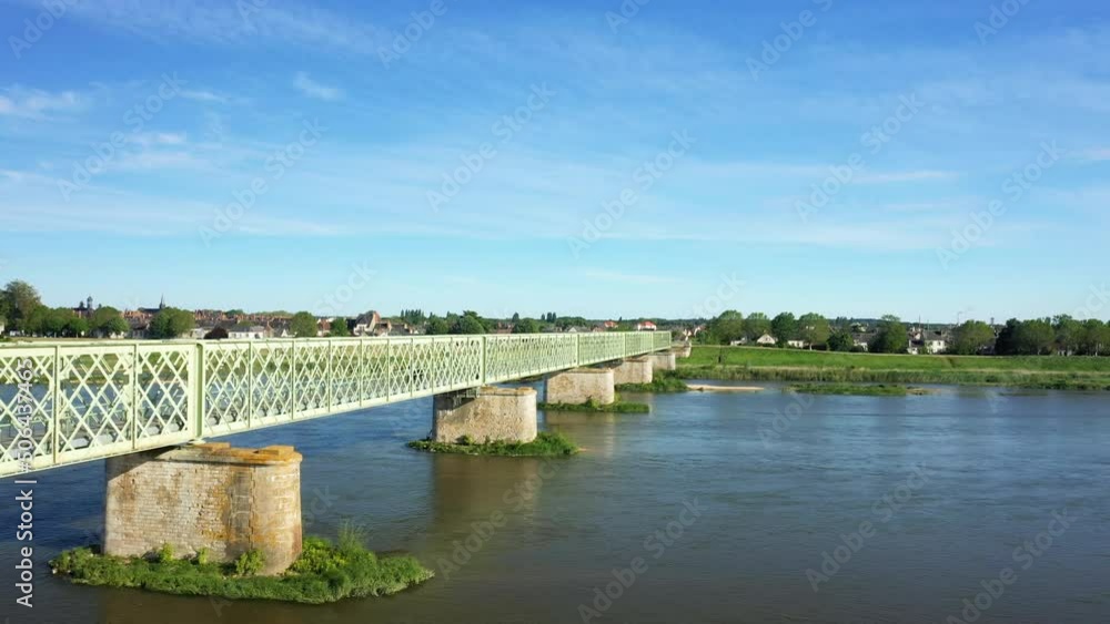 The Loire under the Sully sur Loire bridge in Europe, in France, in the Center region, in the Loiret, in summer, on a sunny day. The Loire under the Sully sur Loire bridge in Europe, in France, in the Center region, in the Loiret, in summer, on a sunny day.