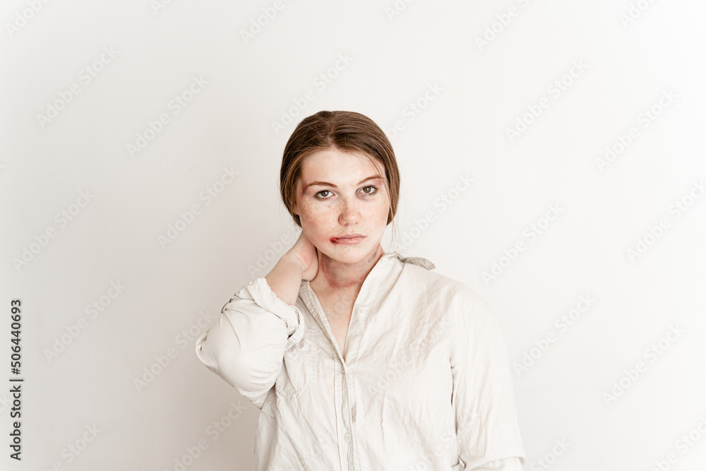 victim of violence, on a white background in a white shirt victim of violence, on a white background in a white shirt