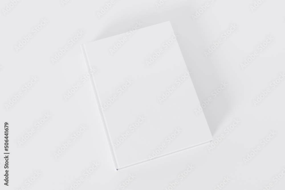 mockup of a rectangular book with a blank glossy cover on white background. Isolated with clipping path. mockup of a rectangular book with a blank glossy cover on white background. Isolated with clipping path.