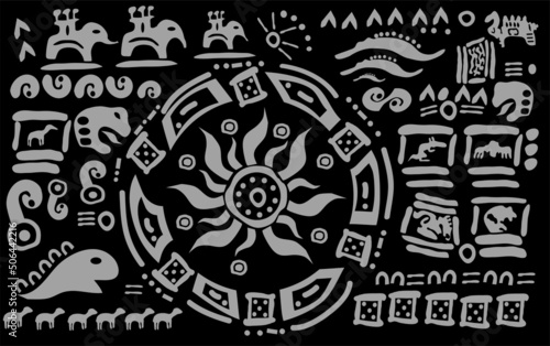 Elements and symbols of ancient America on a black background. Patterns of the ancient civilizations.The Aztecs, Mayans, Incas. photo