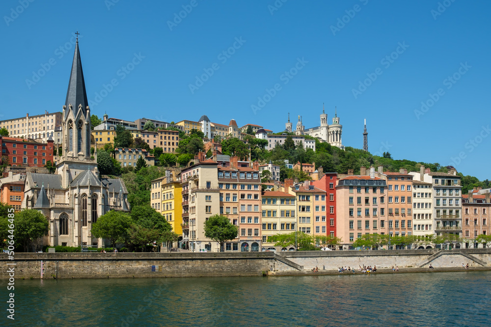 View of the basilica Fourviere at the top of hill and the river Rhône at the picturesque city of Lyon