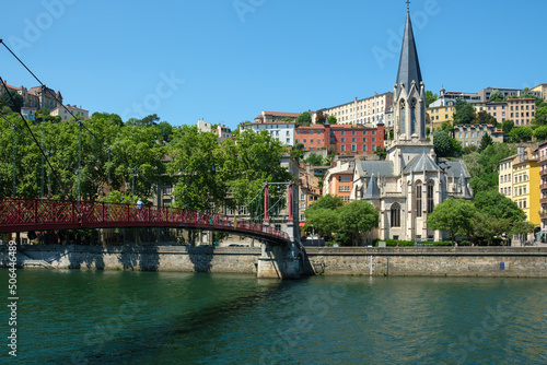 Beautiful view of a pedestrian bridge leading to the picturesque area old area of Lyon and the church Saint George  © DIMITRIOS