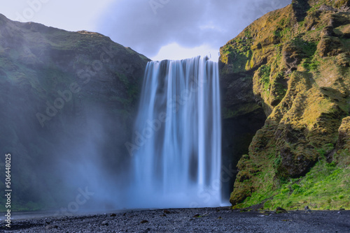 Skogafoss waterfall in Iceland at sunset
