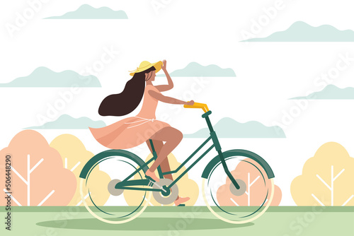 woman riding bike in landscape