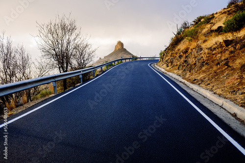 Roque Bentayga seen from the road on a beautiful and misty day photo