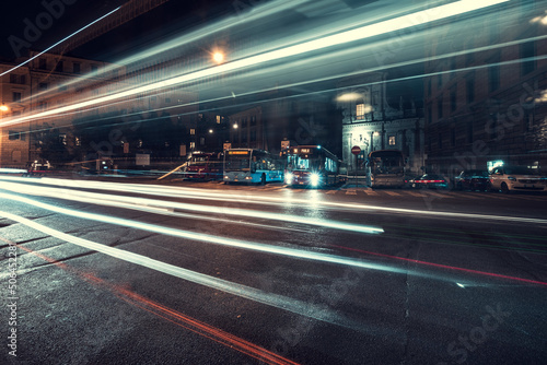 Cool long exposure cars traffic light trails, night view of the city of Rome 