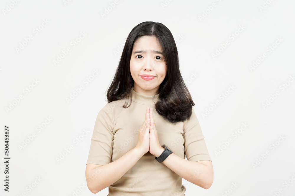 Fold Hands and Apologize, Say Sorry Of Beautiful Asian Woman Isolated On White Background Fold Hands and Apologize, Say Sorry Of Beautiful Asian Woman Isolated On White Background