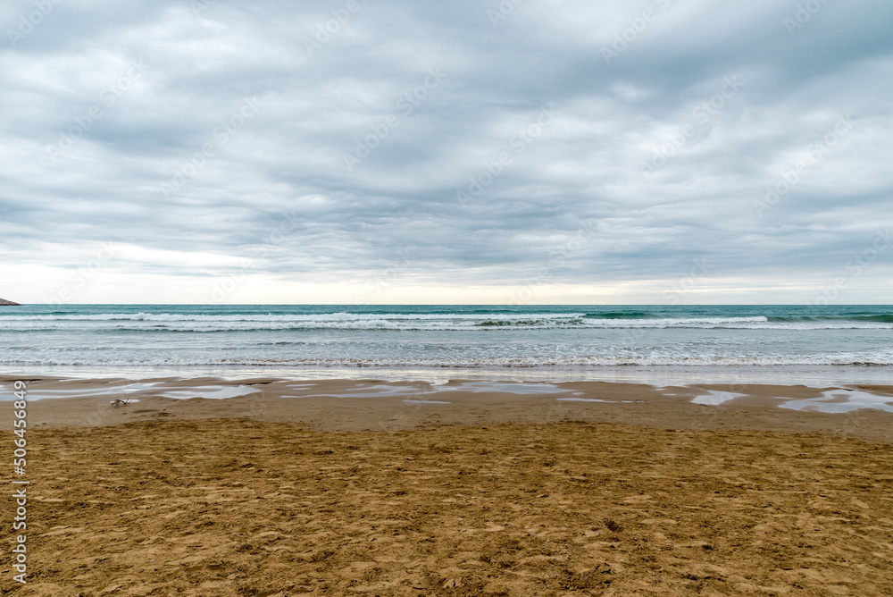 photo of waves on the sea in the surf on a cloudy evening photo of waves on the sea in the surf on a cloudy evening