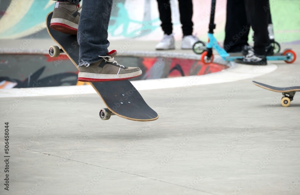 Fototapeta premium skate board trick in skate park Milan.