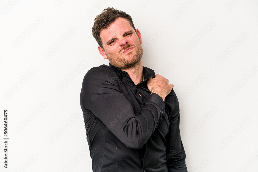 Young caucasian man isolated on white background having a shoulder pain. Young caucasian man isolated on white background having a shoulder pain.