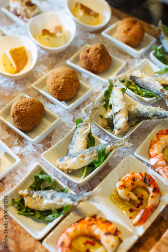 Venetian cicchetti polpette, Sarde in Saor and shrimps with polenta