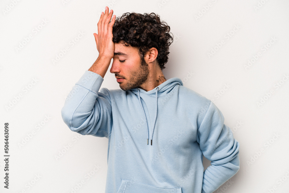 Young caucasian man isolated on white background forgetting something, slapping forehead with palm and closing eyes. Young caucasian man isolated on white background forgetting something, slapping forehead with palm and closing eyes.