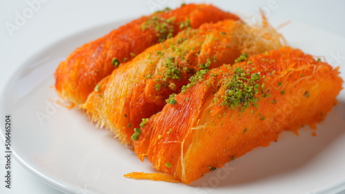 Knafeh - a Middle Eastern cheese pastry soaked in sweet, sugar-based syrup
