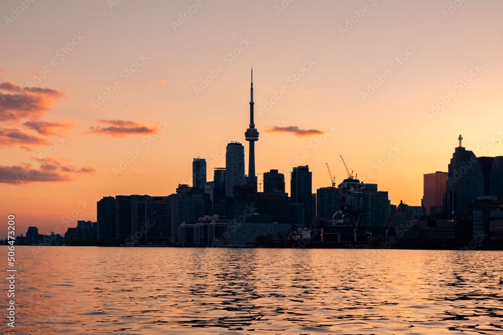 Toronto s skyline at dusk as seen from Polson Pier
