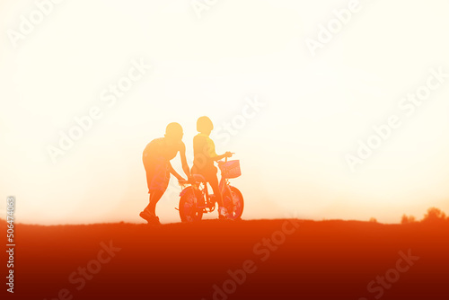 kid silhouette,Moments of the child's joy. On the Nature sunset