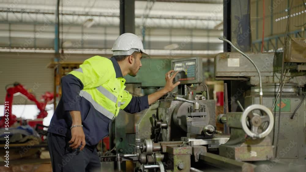 Caucasian workers use a lathe in an industrial factory. Working with labor-saving machines but still controlled by people
Caucasian workers use a lathe in an industrial factory. Working with labor-saving machines but still controlled by people