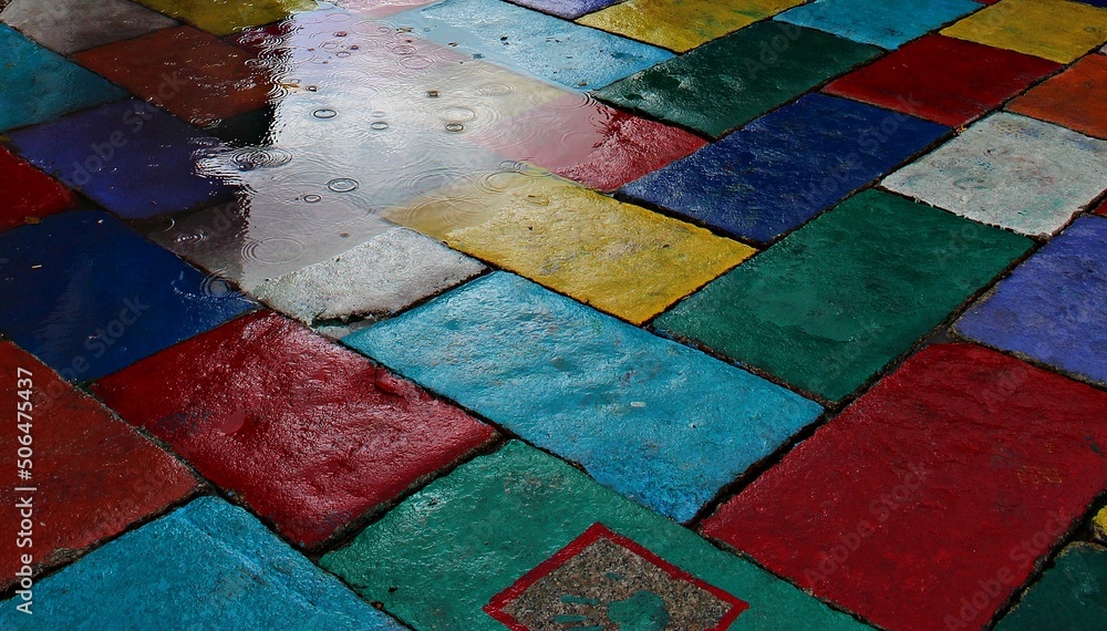 Italy, Sardinia island:  The colored pavement of the streets of Tempio Pausania.