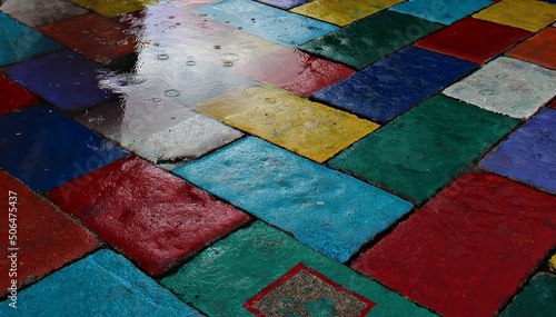 Billede på lærred Italy, Sardinia island:  The colored pavement of the streets of Tempio Pausania