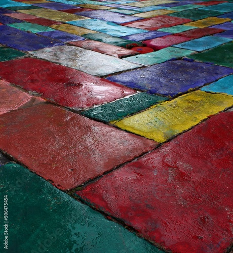 Italy, Sardinia island:  The colored pavement of the streets of Tempio Pausania.
