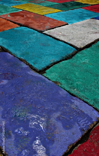 Tableau sur toile Italy, Sardinia island:  The colored pavement of the streets of Tempio Pausania