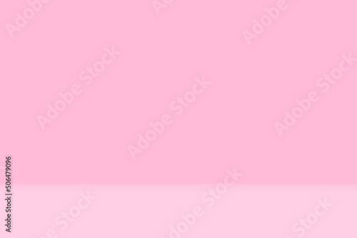 Abstact photographic light pink gradient studio backdrop background.