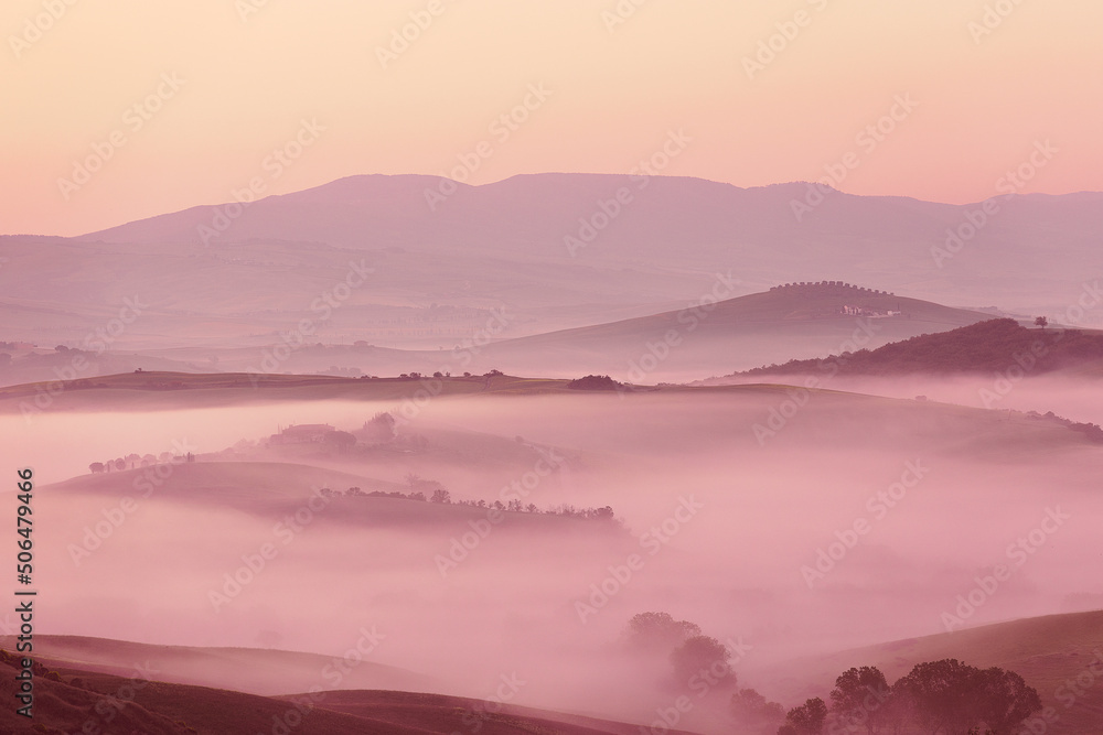 Sunrise with fog over a valley in Tuscany - Italy VII