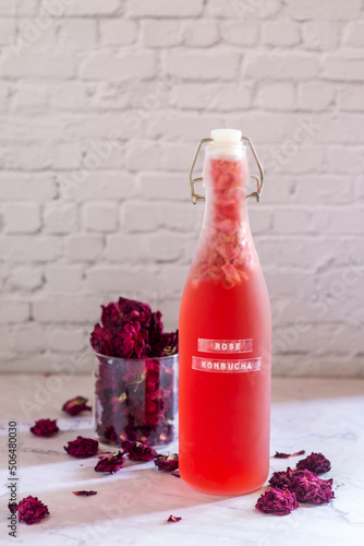 rose Kombucha in glass bottle, fermented tea drink, healthy beverage