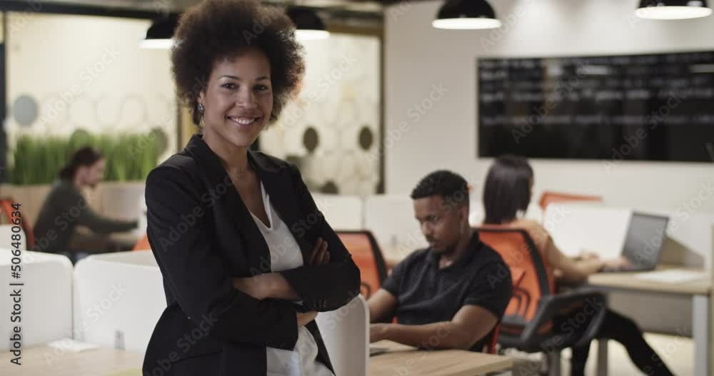 Positive black businesswoman in office Positive black businesswoman in office