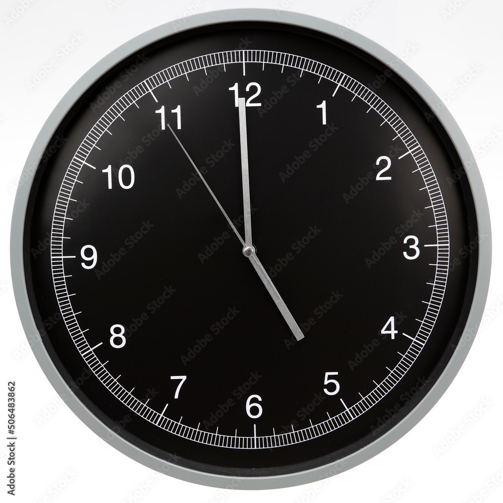 Wall clock showing five o'clock isolated on white background Wall clock showing five o'clock isolated on white background