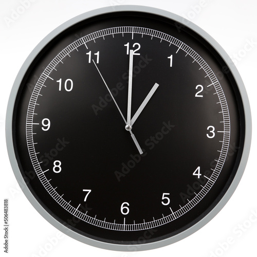 Wall clock showing one o'clock isolated on white background