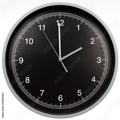 Wall clock showing two o'clock isolated on white background