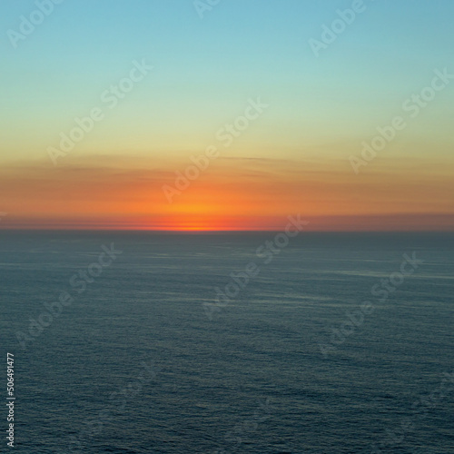 beautiful sunset over the endless expanse of the sea as a natural background