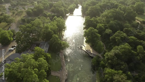 Austin Texas Barton Springs Pool Drone Aerial descending in Early Sunrise