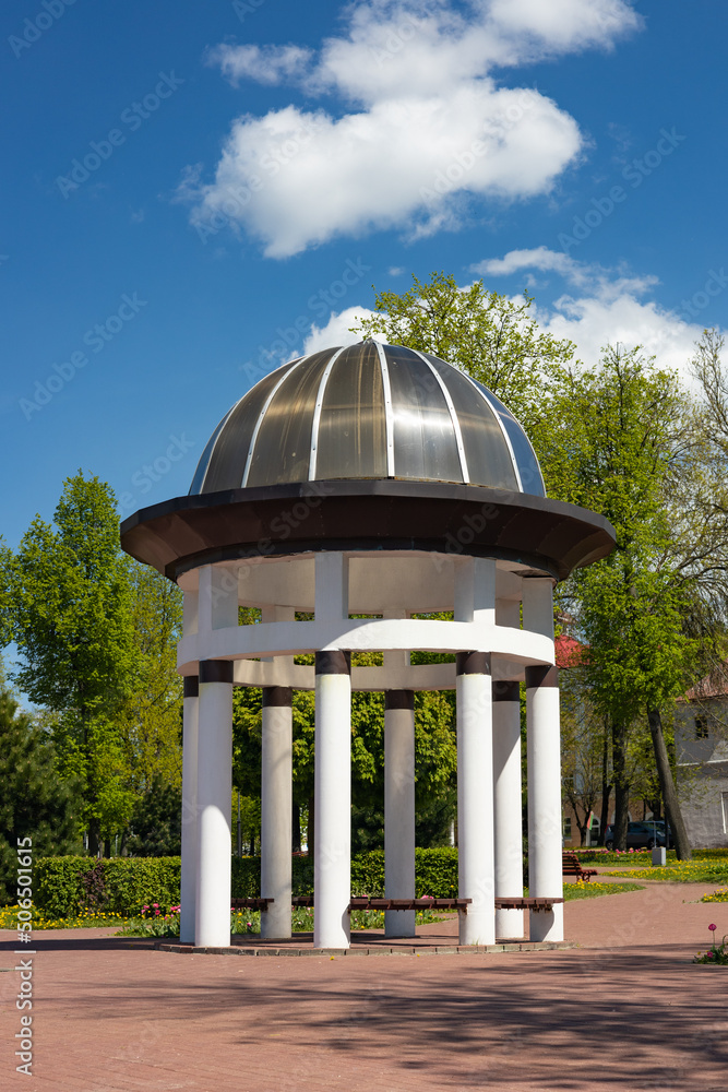 White rotunda, gazebo in the park