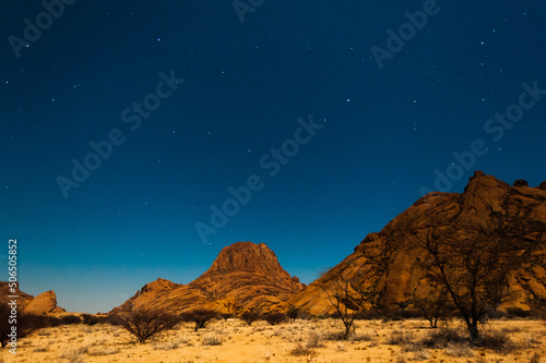 Night shot of the Namibian Desert near Spitzkoppe  under a clear starry southern sky.