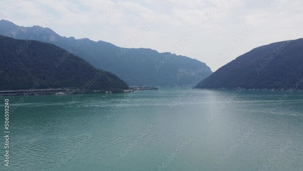 lake Lugano in summer with mountains and forest in background lake Lugano in summer with mountains and forest in background