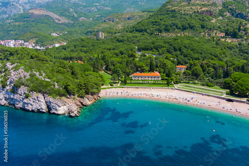 Montenegro. Adriatic Sea. Milocer beach. Summer. Sunny weather. High season. A very popular tourist spot. Drone. Aerial view photo