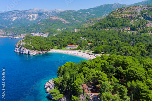 Montenegro. Adriatic Sea. Milocer beach. Summer. Sunny weather. High season. A very popular tourist spot. Drone. Aerial view photo