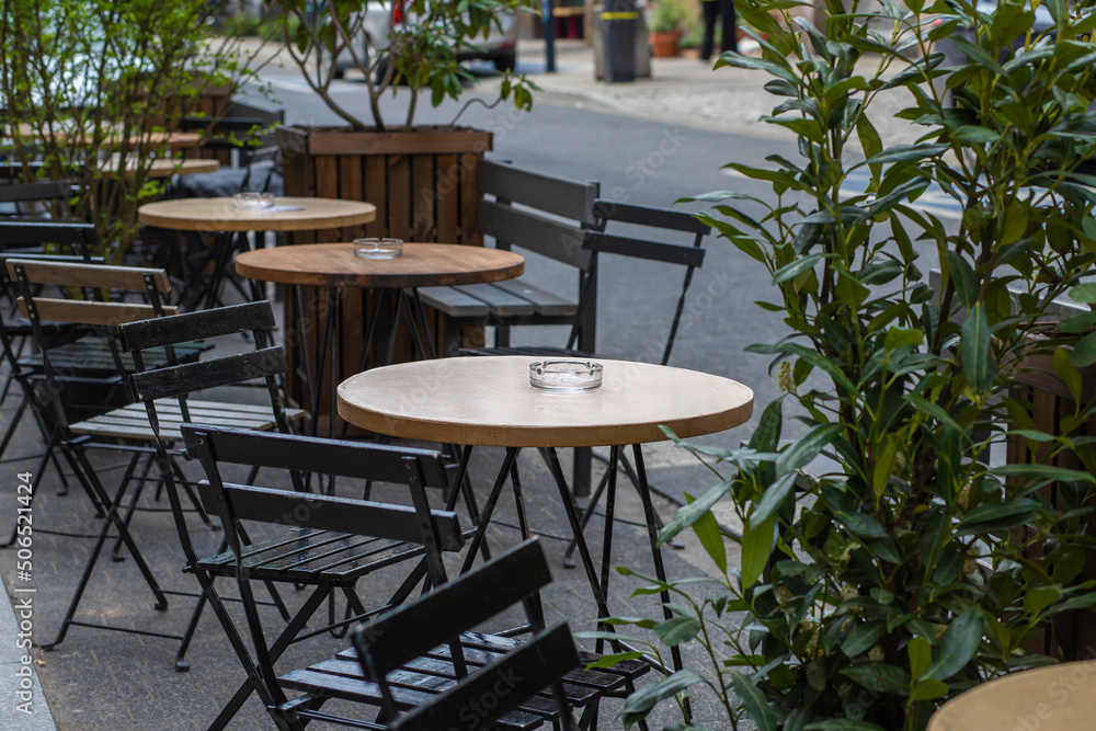 Obraz premium table and chairs in a restaurant