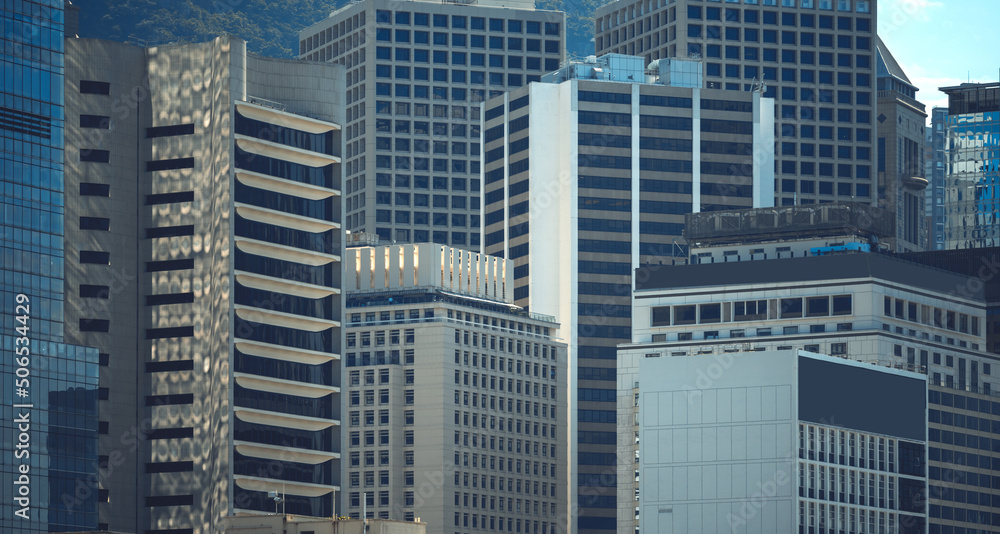 Fototapeta premium Modern office building close up in Hong Kong